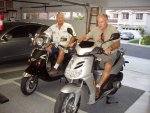 Neil and brother Roy with scooters in safe mode.JPG