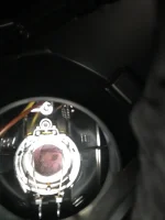 Behind headlight bulb socket.jpg Behind headlight bulb socket.jpg